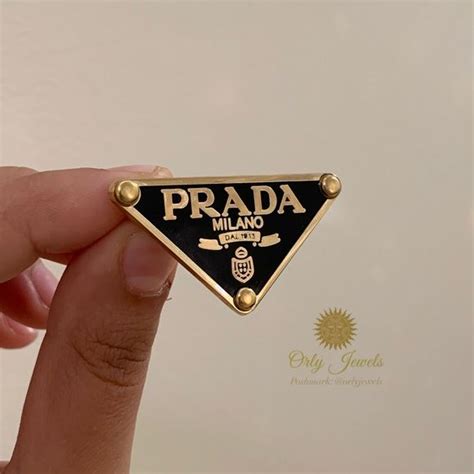 prada lapel pin